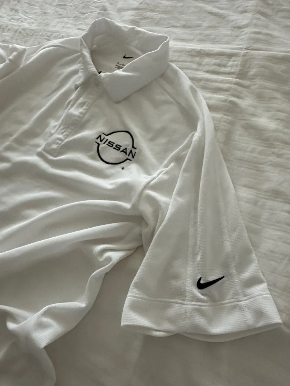 Nike White Polo Shirt with Black Nissan Logo